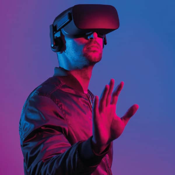 Man immersed in a virtual reality experience, showcasing the transformative power of technology in the Gadget Cosmos.